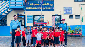 Kids visit Satdobato police station to interact with officers.