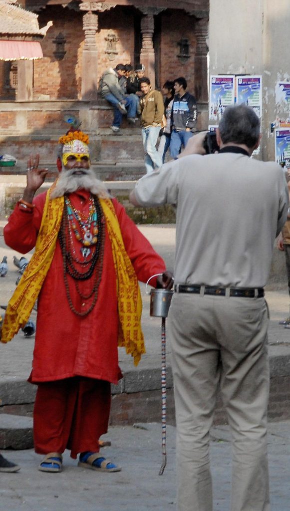foreigner taking picture of saint