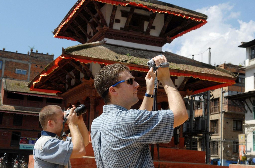 foreigner taking pics of temples 