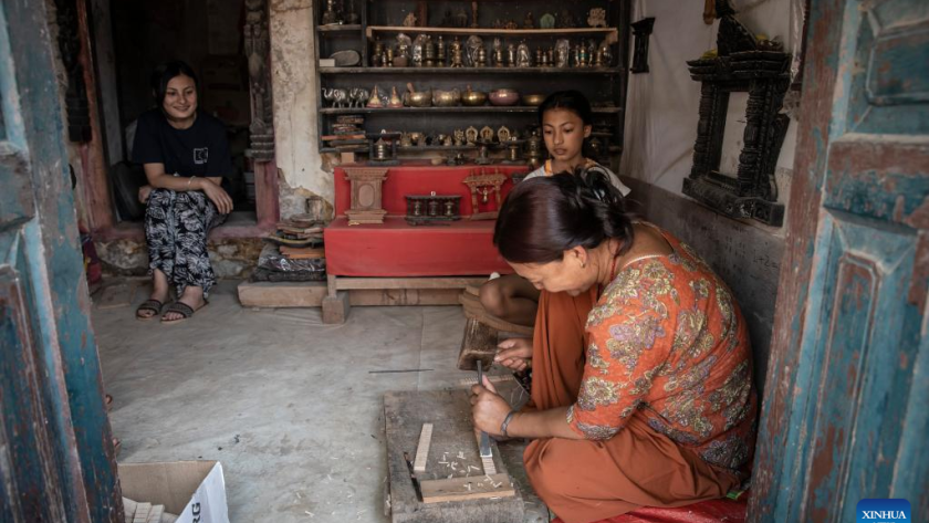 wood carving in lalitpur