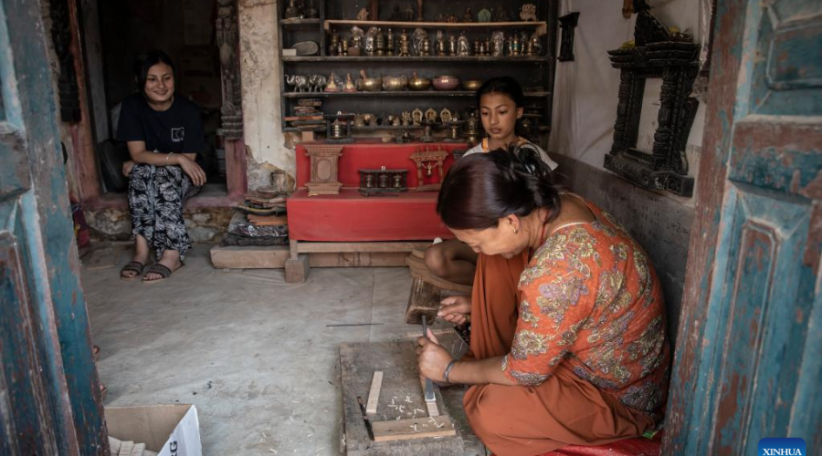 wood carving in lalitpur
