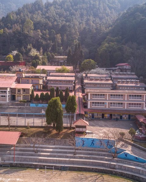 Private school in Lalitpur Nepal with modern academic buildings and sports facilities